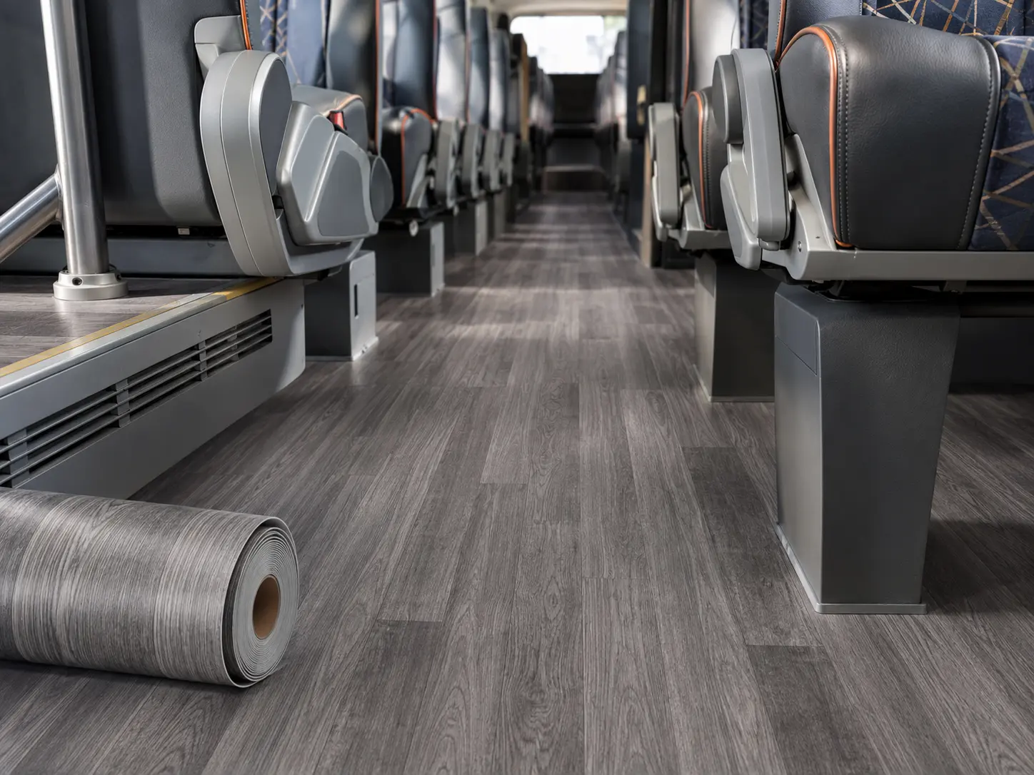 PVC transportation flooring installed in a commercial bus interior