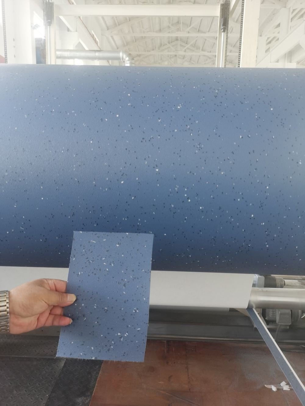 Customer reference sample compared with OEM trial PVC flooring roll